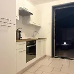 Apartmán Appart'hotel61 D'ouverture Au Pied De Tous Commerces & Commodites Ainsi Que Marche Mercredi & Samedi
